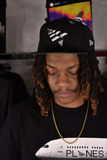 Paper Planes The Original crown 9FIFTY snapback hat in black w/green undervisor